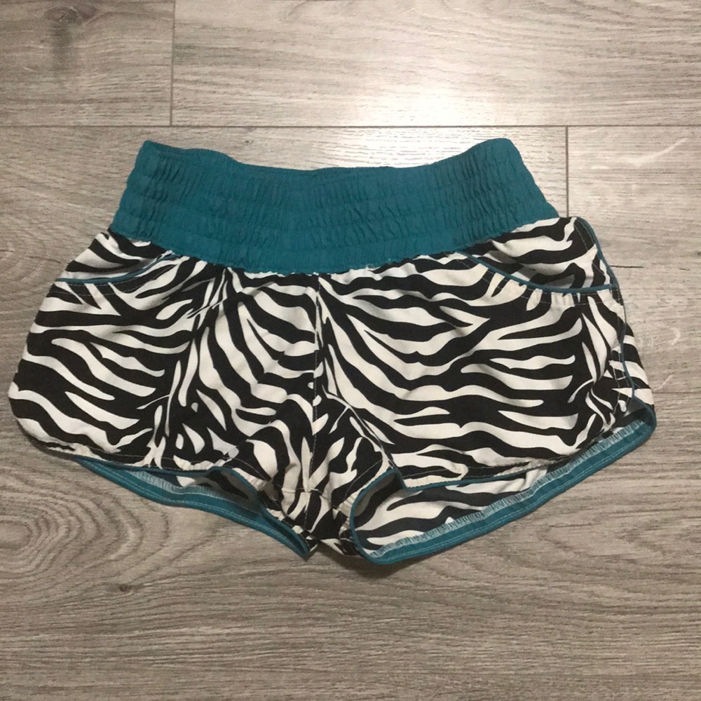 Zebra print teal board shorts